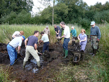 Volunteers digging a new turf pond in 2008